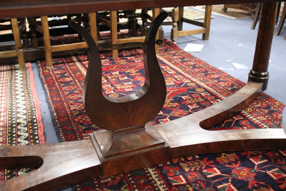 A French mahogany centre table, with simulated marble painted pine top, W.187cm D.80cm H.76cm